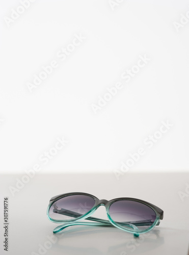 sunglasses on blue background