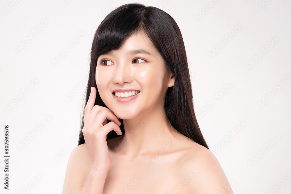 Beautiful Young Asian Woman with Clean Fresh Skin. Face care, Facial treatment, on white background, Beauty and Cosmetics Concept. Beautiful Young Asian Woman with Clean Fresh Skin. Face care, Facial treatment, on white background, Beauty and Cosmetics Concept.