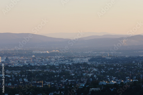 Beautiful sunset with the view of the skyline over the hills around Vienna, Austria