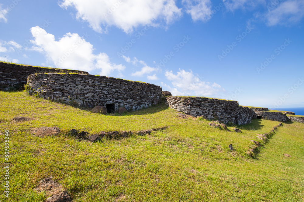 The village of Orongo, a stone village and ceremonial center on the rocky ridge of the Rano Kau crater on Easter Island. Easter Island, Chile