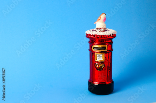 Photography glass postbox decoration on light blue background