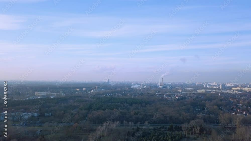 drone descending heading towards the city of Berlin drone descending heading towards the city of Berlin