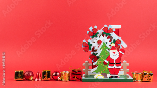 Stop motion animation of New Years balls, gift and bis wooden Santa Claus figurine