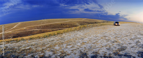 Panoramic view of country roads on top of a mountain before a thunderstorm. photo