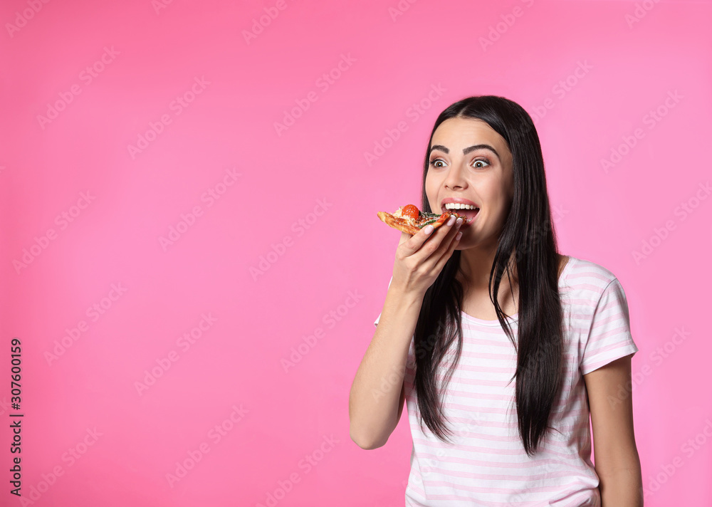 Emotional woman with pizza on pink background, space for text Emotional woman with pizza on pink background, space for text