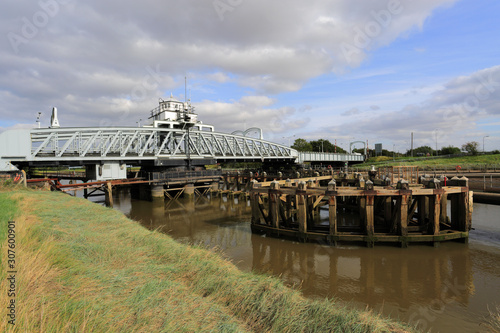 The Crosskeys Swing bridge over the river Nene, Sutton Bridge village, South Holland district, Lincolnshire, England.