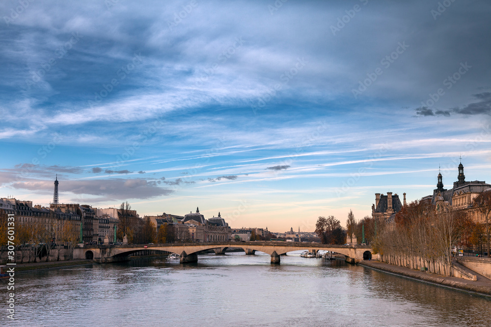 Autumn day in Paris  by Seine river , France.