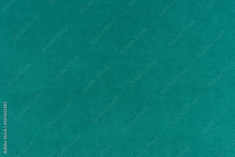 Closeup green fabric texture background Closeup green fabric texture background