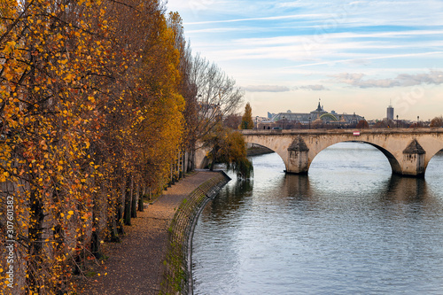 Autumn day in Paris by Seine river , France.