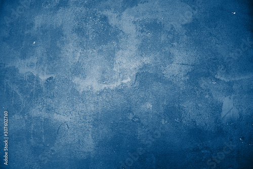 Beautiful abstract classic blue grunge decorative navy dark wall background. Art rough stylized texture banner With space for text. Grunge classic blue texture.