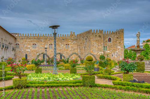 Archbishop palace viewed through gardens of Santa Barbara in Braga, Portugal photo