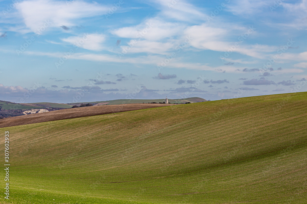 Looking out over gentle rolling hills in the Sussex countryside, on a sunny winters day