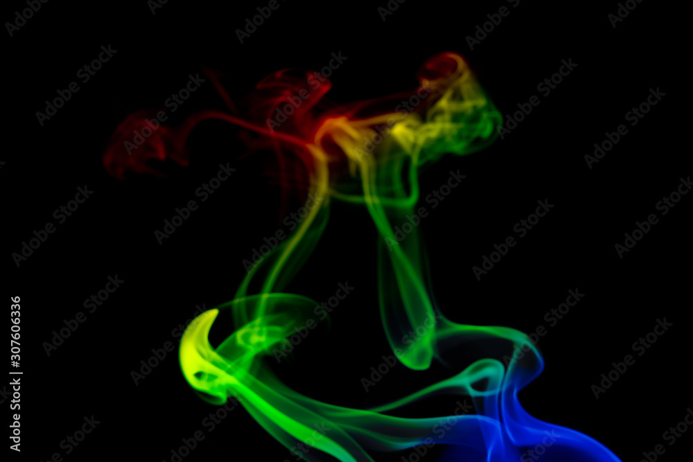 multicolored smoke photo aginst balck background