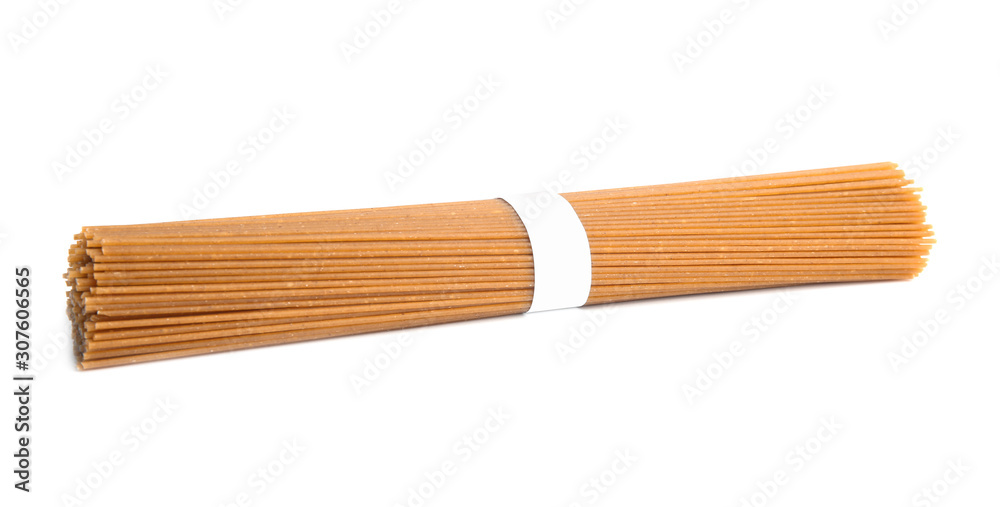 Uncooked buckwheat noodles isolated on white. Japanese cuisine Uncooked buckwheat noodles isolated on white. Japanese cuisine