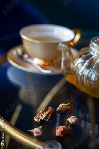 Tea cup and tea pot, rose leaf tea