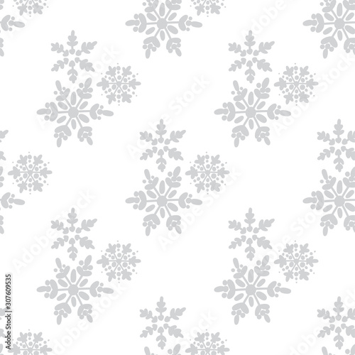 Grey silver or monochrome light seamless snowflakes patterns. Doodle cute design. Great for print  pakage  web pages  clothes. New year and Christmas tender winter style