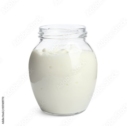 Tasty organic yogurt in glass jar isolated on white