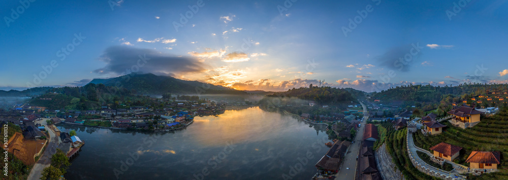 MAE HONG SON, THAILAND - NOVEMBER 24, 2019: Beautiful aerial high angle drone view of Ban Rak Thai Village in sunrise, a Village of Chinese settlement in Mae Hong Son province, Northern Thailand and n