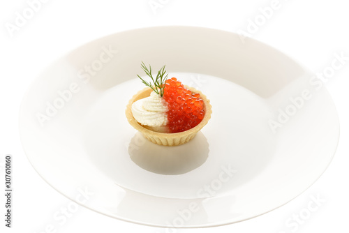 red caviar in a basket of dough with cream cheese on a white plate