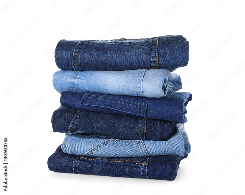 Stack of different jeans isolated on white Stack of different jeans isolated on white