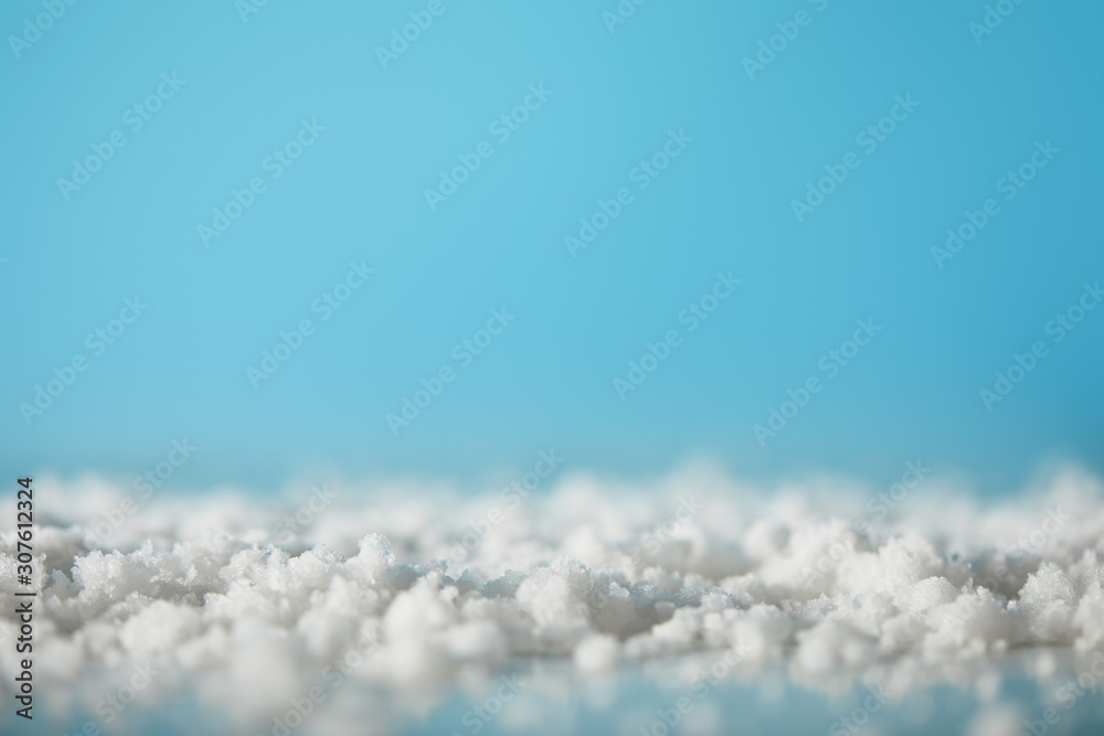 decorative snow on blue for christmas background