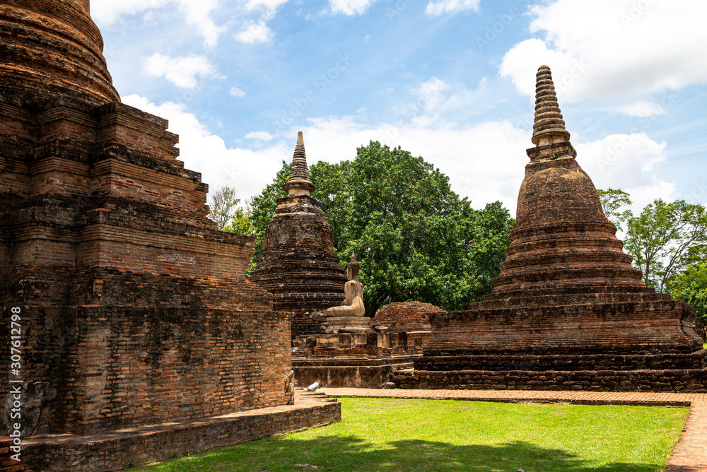 Fototapeta premium View of Buddha statue in Sukhothai temple, Thailand 2019