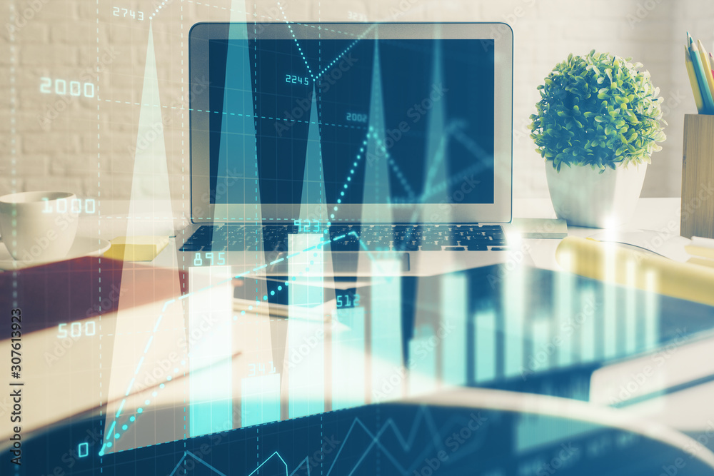 Stock market graph and table with computer background. Double exposure. Concept of financial analysis. Stock market graph and table with computer background. Double exposure. Concept of financial analysis.