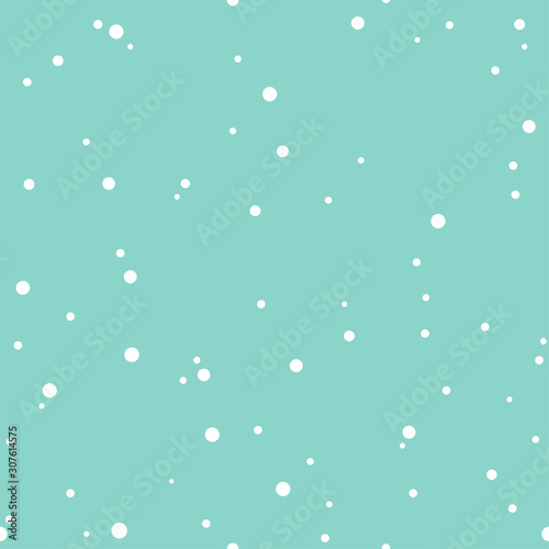 Winter seamless pattern. Sky with flat white snow dots on powder blue background.