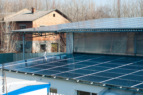 Solar Panels on Roof in Residential Estate with Soft focus Background