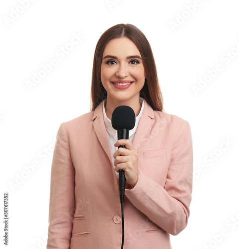 Young female journalist with microphone on white background