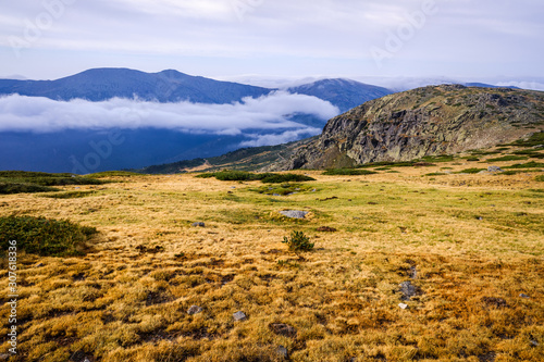 Mountain landscape with autumn clouds.