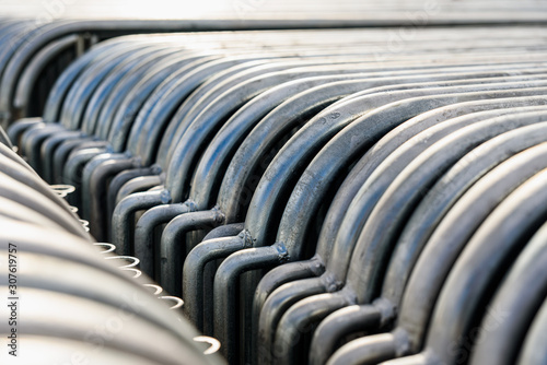 Detail of portable steel barriers stacked together before a public event