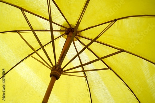 Yellow umbrella background - vintage style pictures.