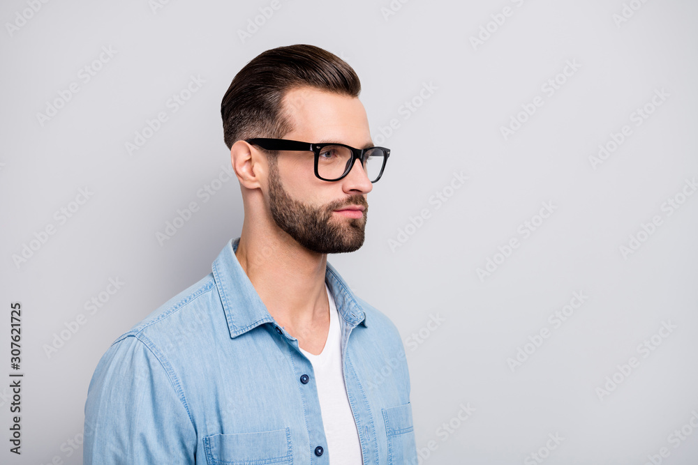 Closeup photo of amazing macho guy serious looking empty space young promoted boss chief wear specs casual denim outfit isolated grey color background
