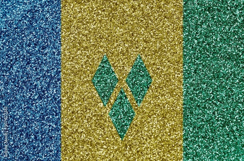 Saint Vincent and the Grenadines flag depicted on many small shiny sequins. Colorful festival background for party photo