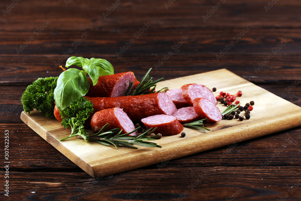 sausage slices, smoked meat product (tasty snack salami) menu concept. food background with cracow sausages sausage slices, smoked meat product (tasty snack salami) menu concept. food background with cracow sausages