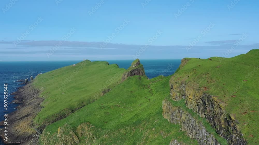 Aerial view of the Mykines island. Mykines island, Faroe Islands, Europe. Aerial view of the Mykines island. Mykines island, Faroe Islands, Europe.