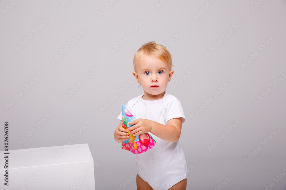 toddler wearing birthday cap on isolated background toddler wearing birthday cap on isolated background