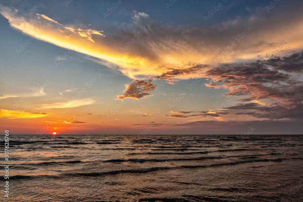 Sea sunset winter, clouds, waves, wind