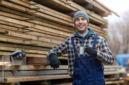 Young male worker in timber warehouse  © pikselstock