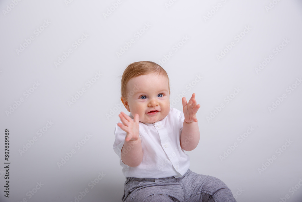 portrait of baby clapping his hands isolated on white background portrait of baby clapping his hands isolated on white background