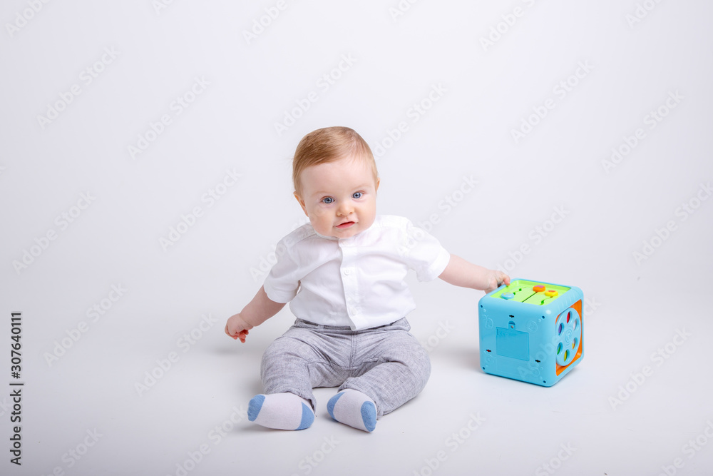 toddler with toy isolated on white background toddler with toy isolated on white background