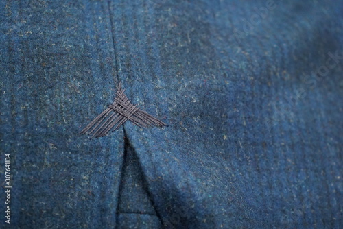 Handmade detail on a tailored jacket