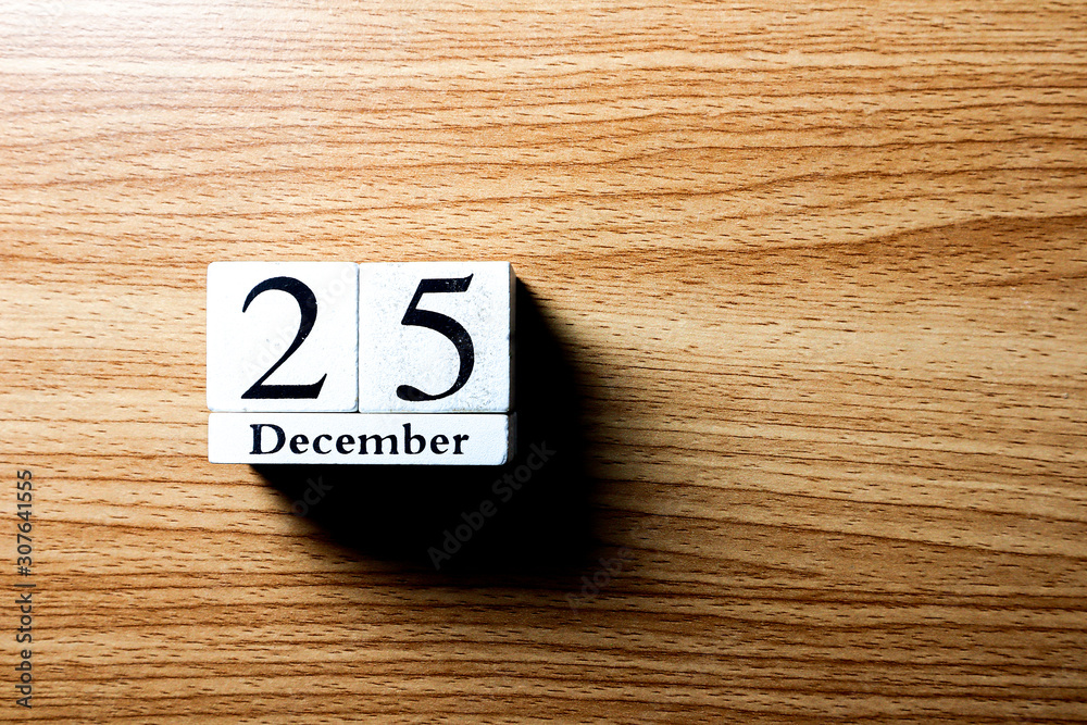 25 December Alphabet on a wooden table 25 December Alphabet on a wooden table