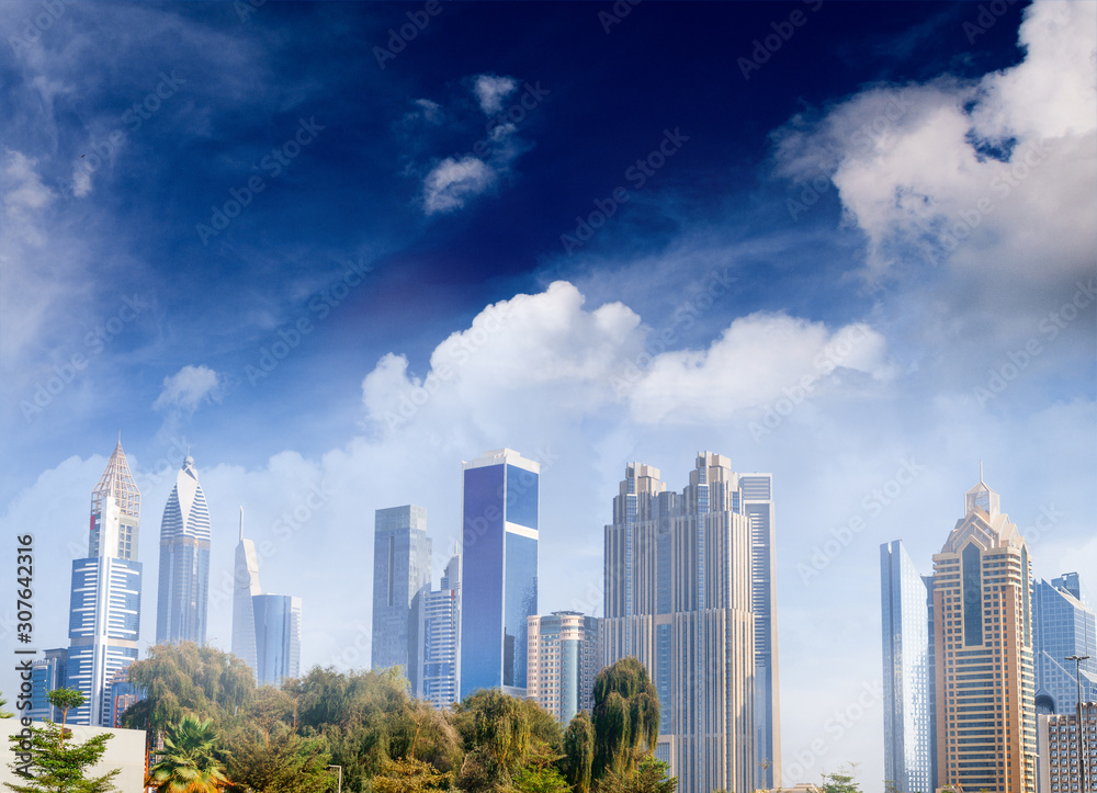 Fototapeta premium Dubai panoramic skyline and buildings at sunset
