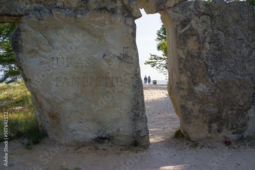 Cape Kolka, Courland Peninsula, Baltic sea, Latvia - July, 2018: The stone monument on the Kolka Cape photo