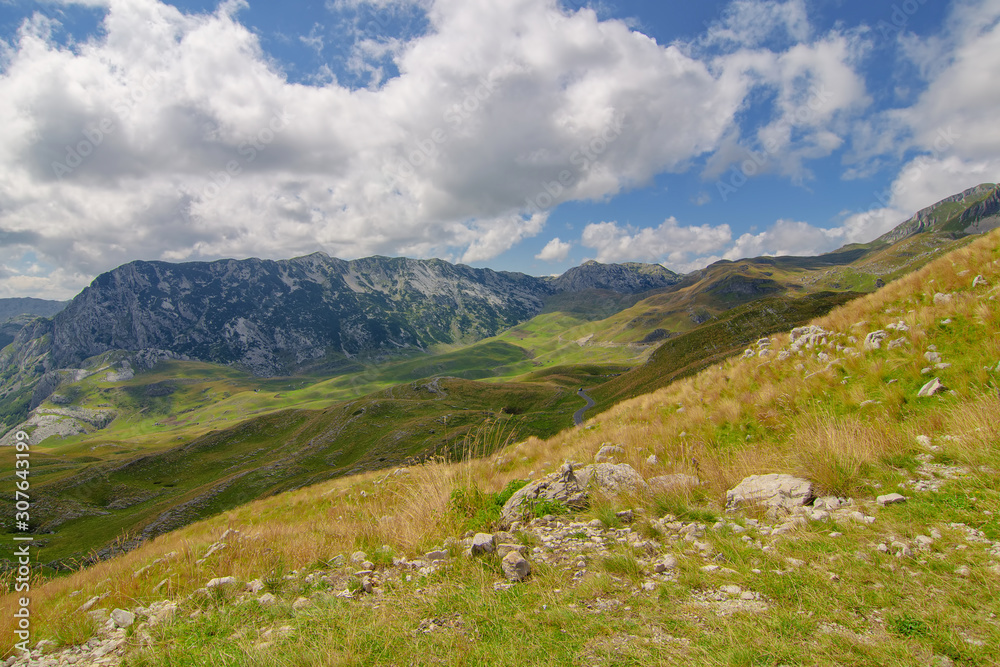 Summer mountaine landscape with cloudy sky. Mountain scenery, National park Durmitor, Zabljak, Montenegro