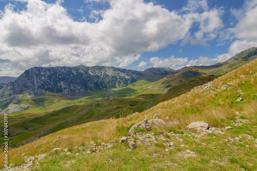 Summer mountaine landscape with cloudy sky. Mountain scenery, National park Durmitor, Zabljak, Montenegro