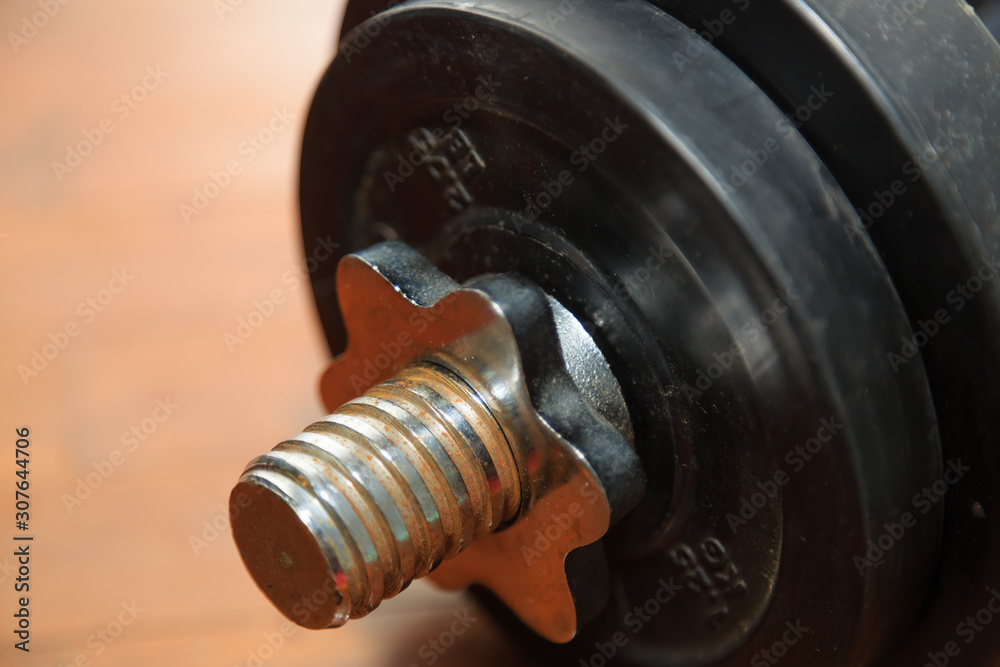 the old rusty rubberized dumbbell close up view the old rusty rubberized dumbbell close up view