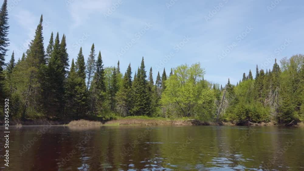 Kayak river trip through Mont Tremblant National Park forest in Quebec, Canada Kayak river trip through Mont Tremblant National Park forest in Quebec, Canada